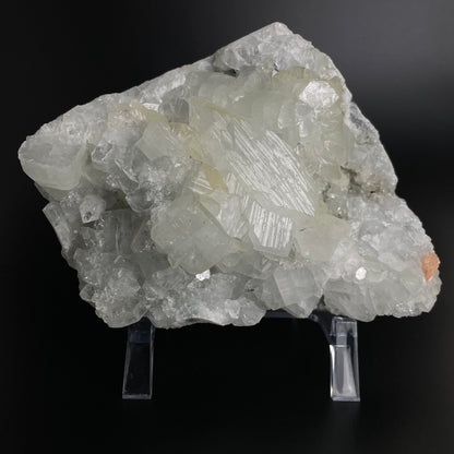 A zeolite cluster with distinctive earth-toned crystal formations.