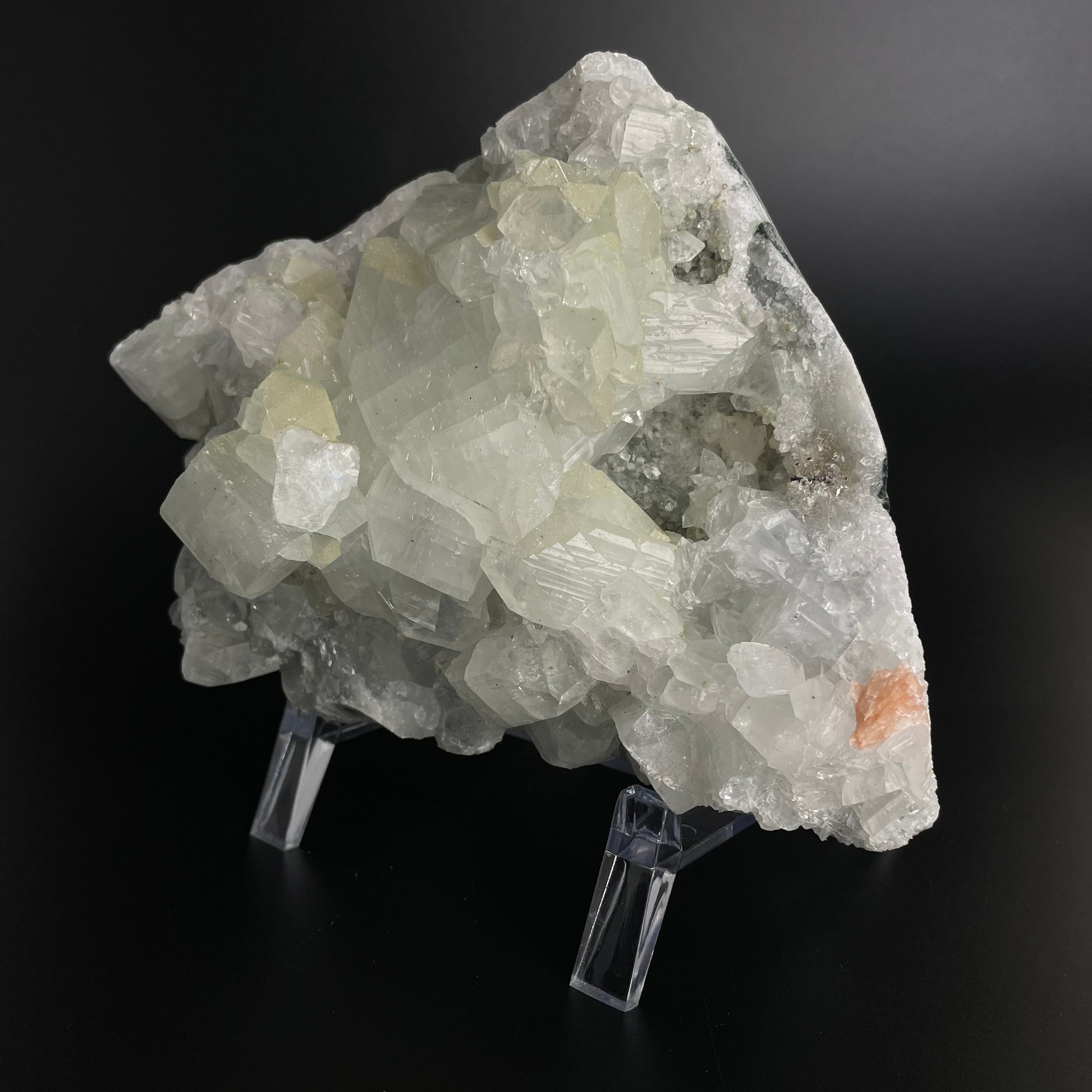 A zeolite cluster with distinctive earth-toned crystal formations.