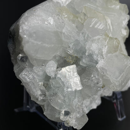 A zeolite cluster with distinctive earth-toned crystal formations.