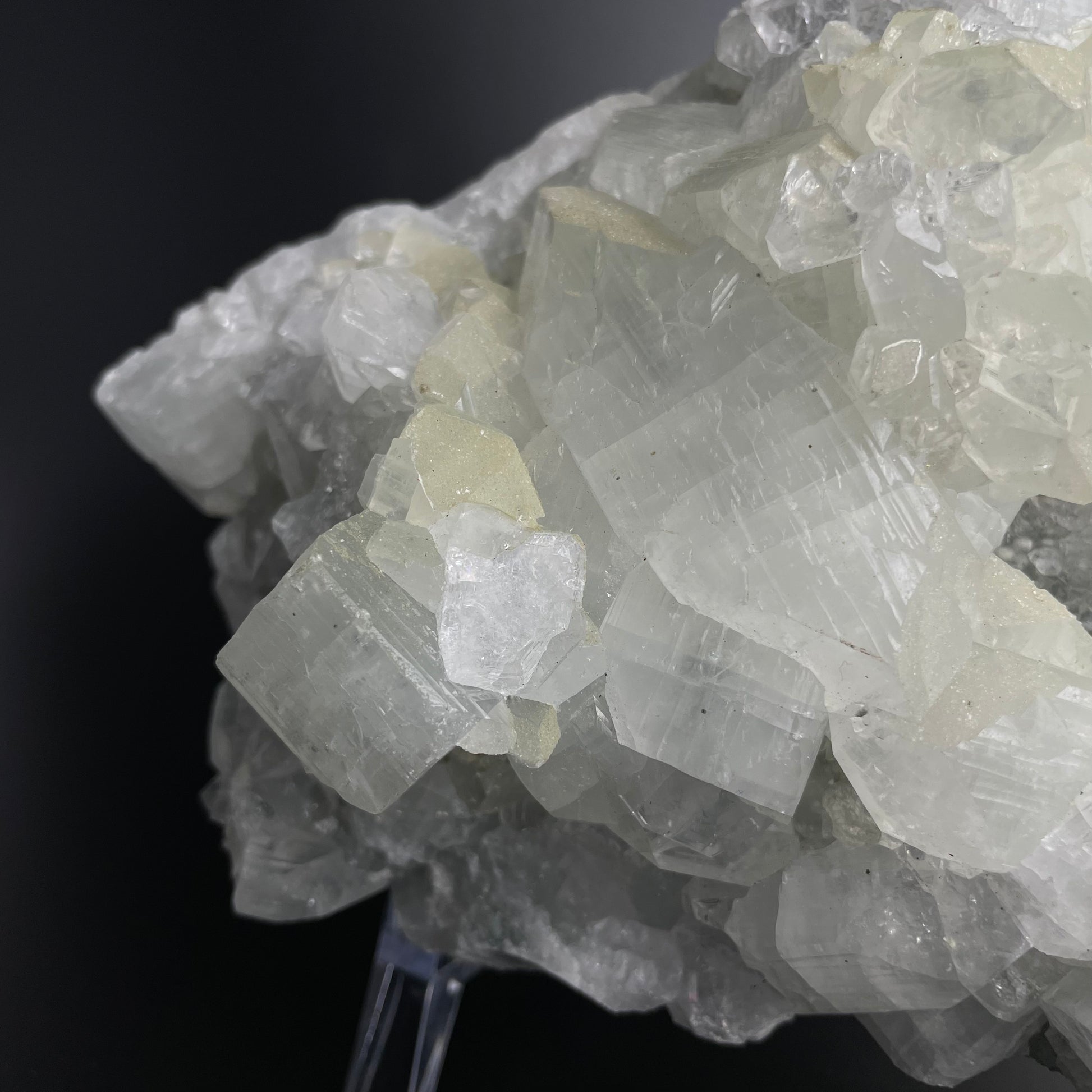 A zeolite cluster with distinctive earth-toned crystal formations.