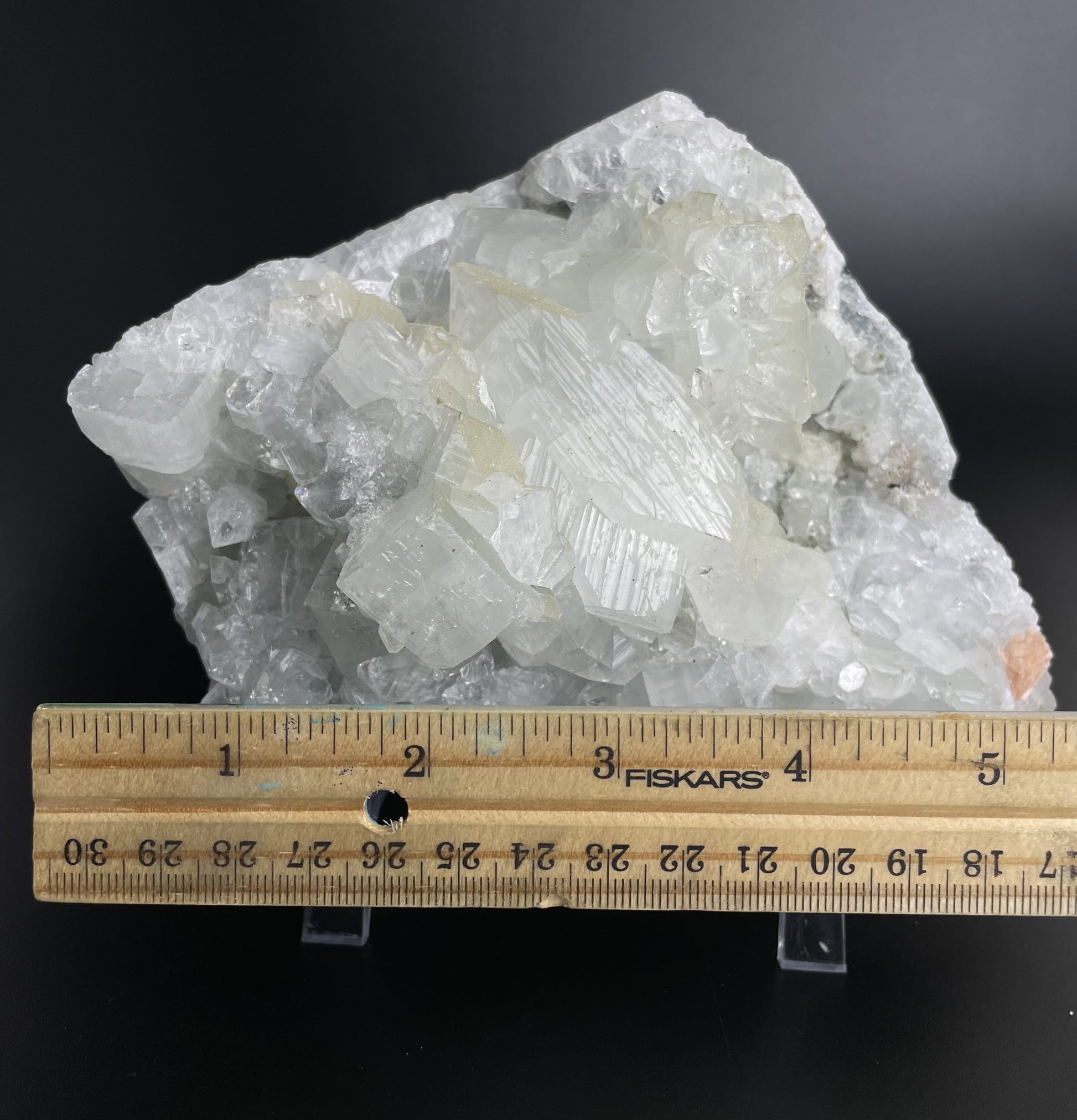 A zeolite cluster with distinctive earth-toned crystal formations.