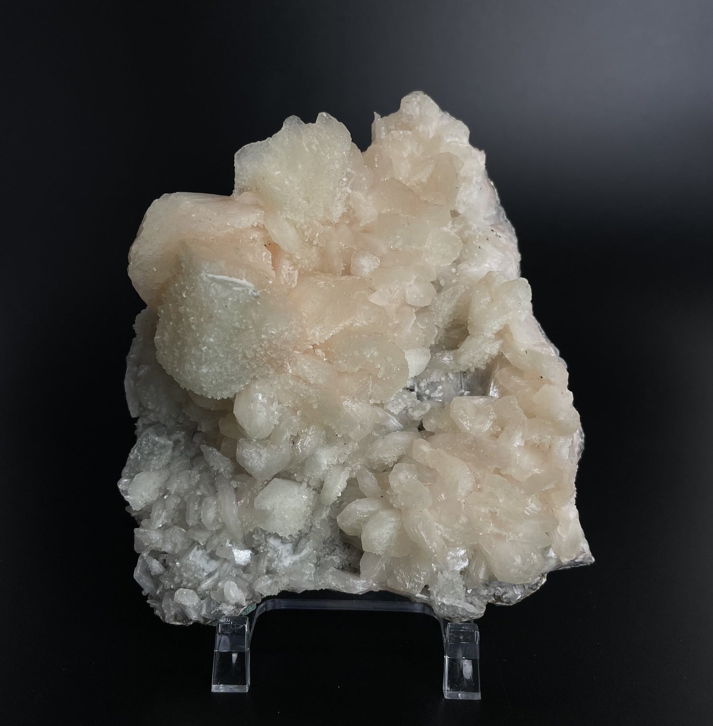 A zeolite cluster with distinctive earth-toned crystal formations.