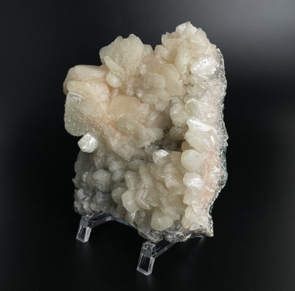 A zeolite cluster with distinctive earth-toned crystal formations.