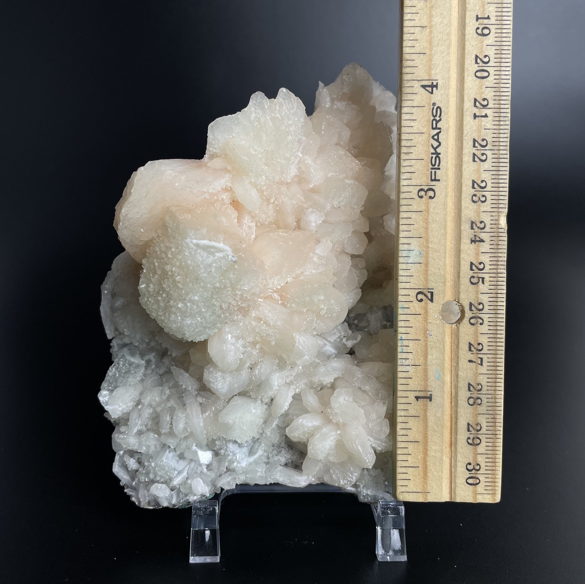 A zeolite cluster with distinctive earth-toned crystal formations.