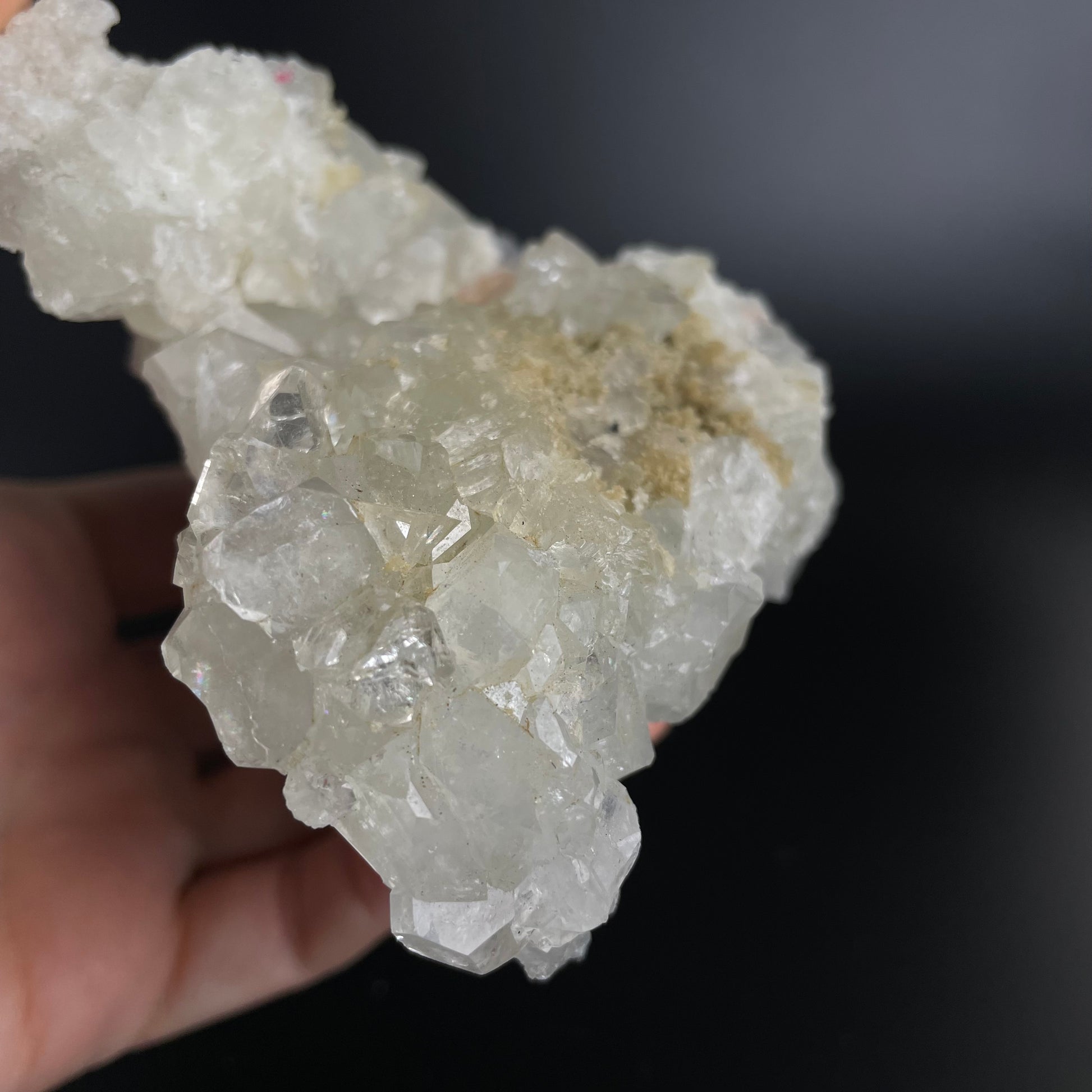 A zeolite cluster with distinctive earth-toned crystal formations.