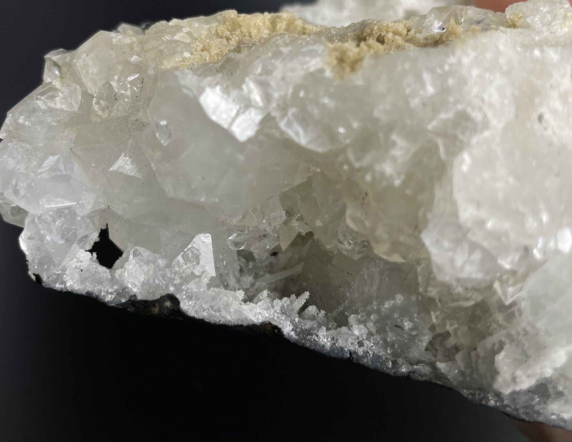 A zeolite cluster with distinctive earth-toned crystal formations.