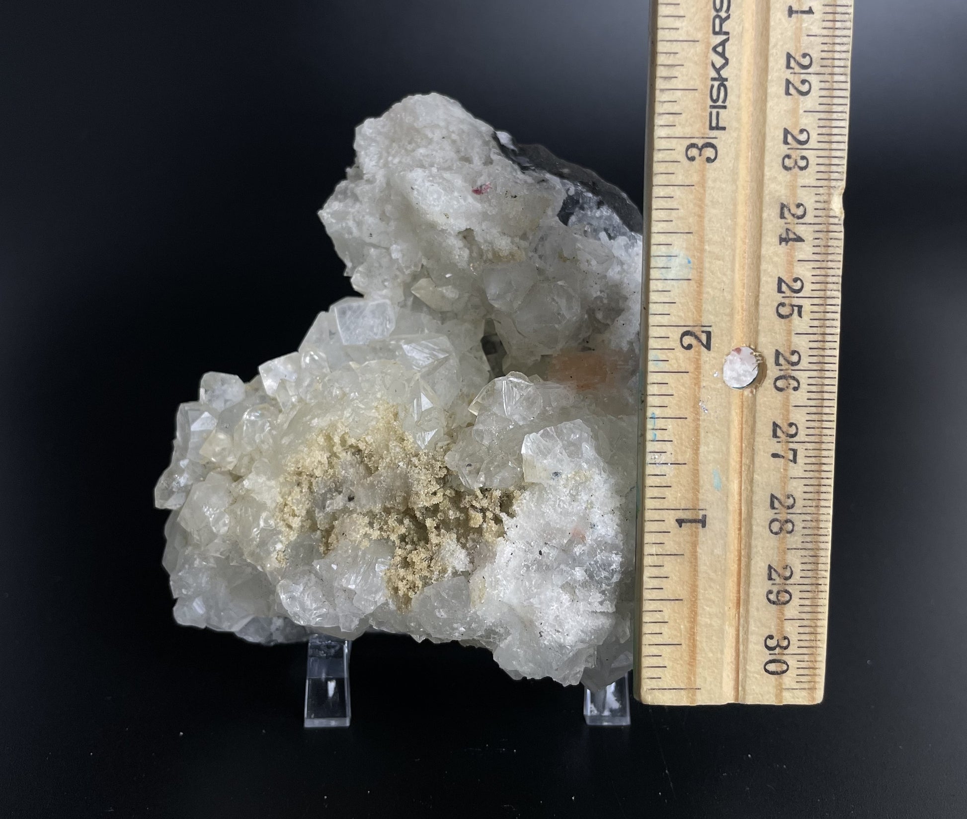 A zeolite cluster with distinctive earth-toned crystal formations.