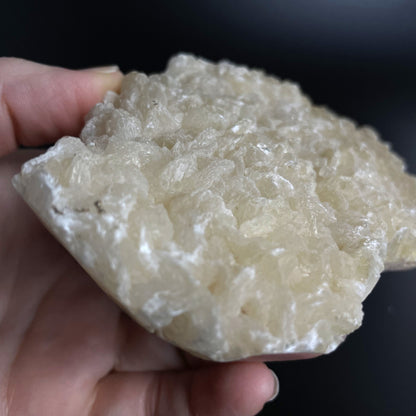 A zeolite cluster with distinctive earth-toned crystal formations.