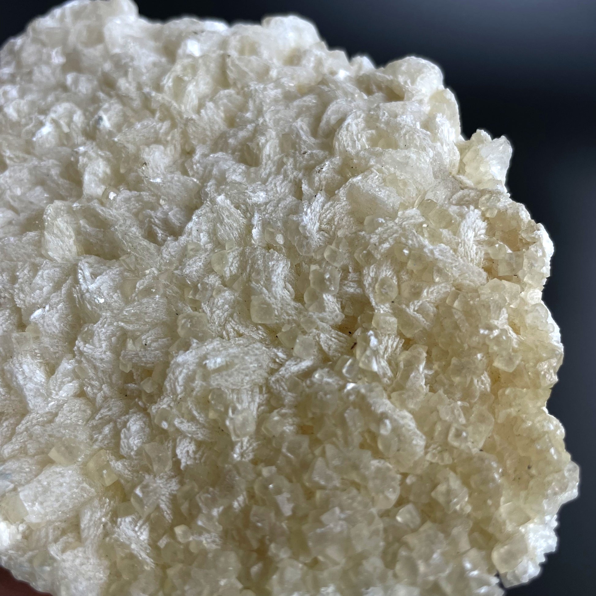 A zeolite cluster with distinctive earth-toned crystal formations.