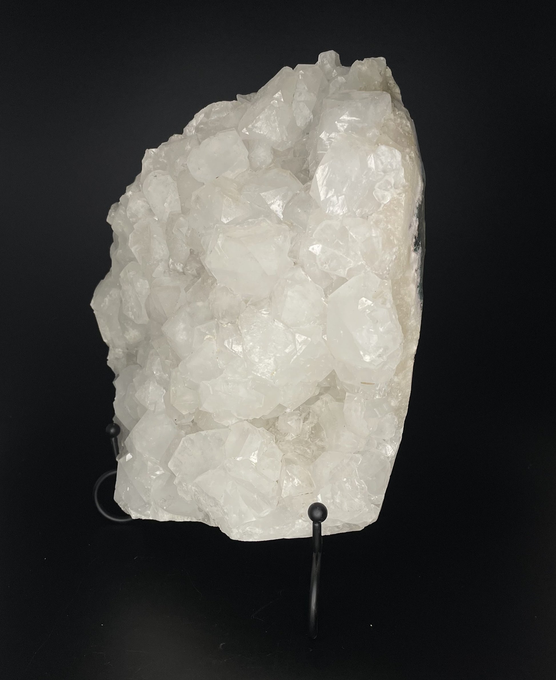 A zeolite cluster with distinctive earth-toned crystal formations.