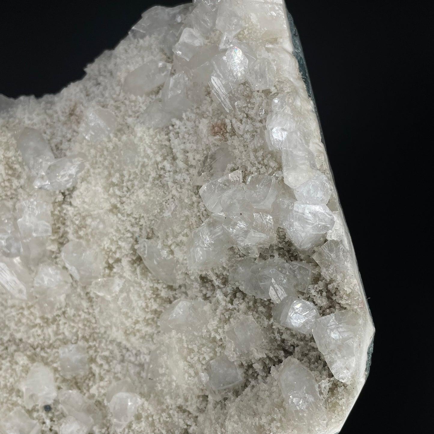 A zeolite cluster with distinctive earth-toned crystal formations.