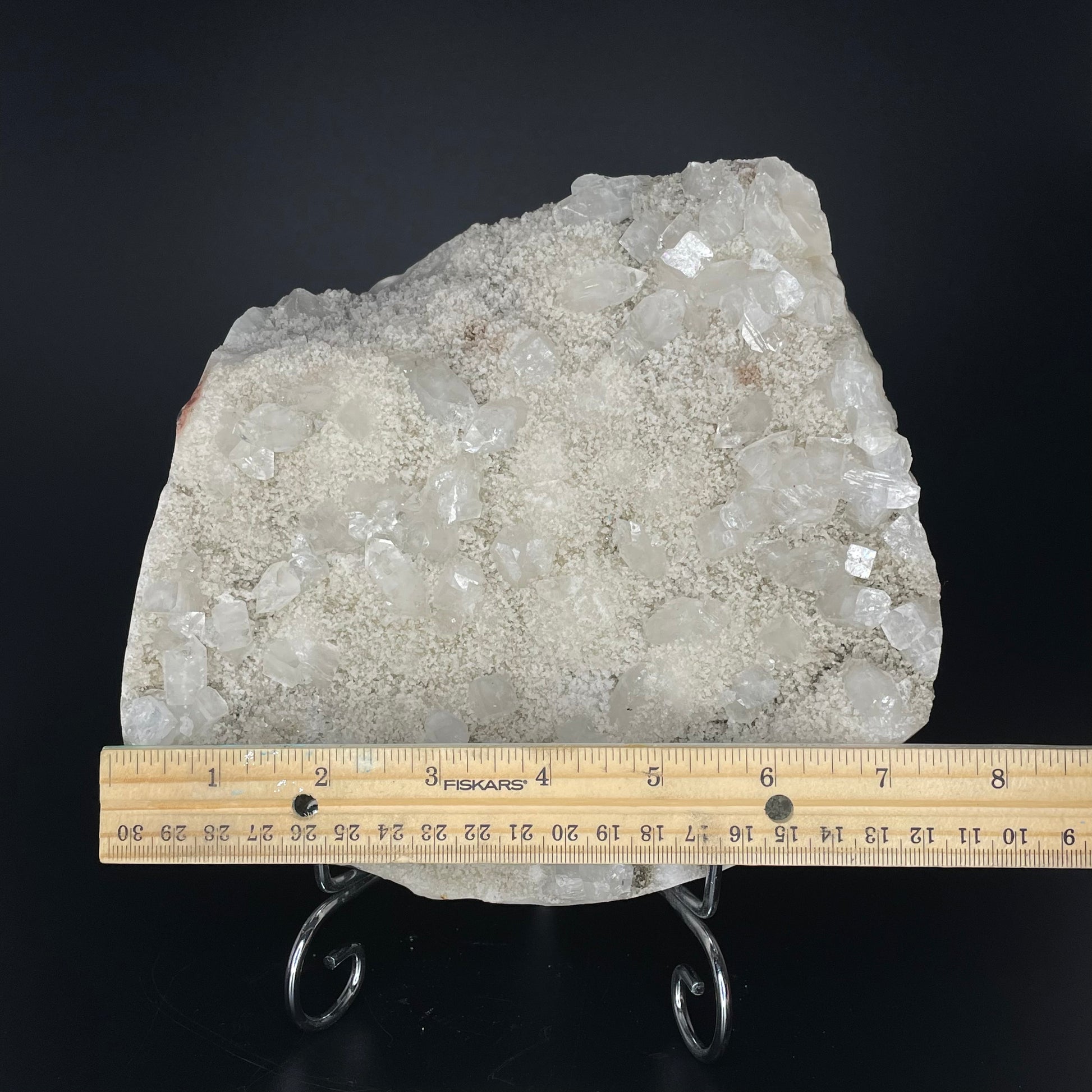 A zeolite cluster with distinctive earth-toned crystal formations.