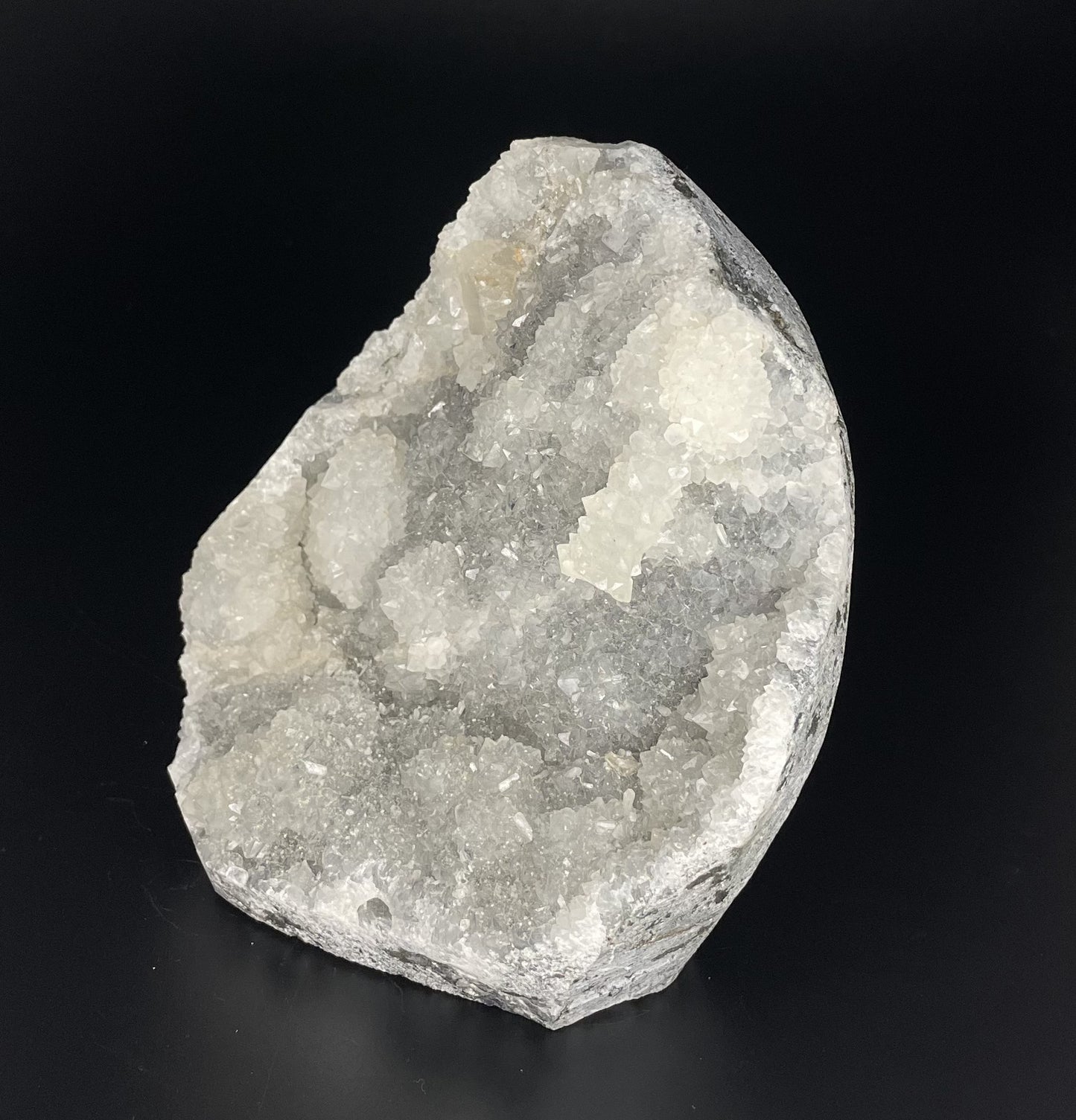 A zeolite cluster with distinctive earth-toned crystal formations.