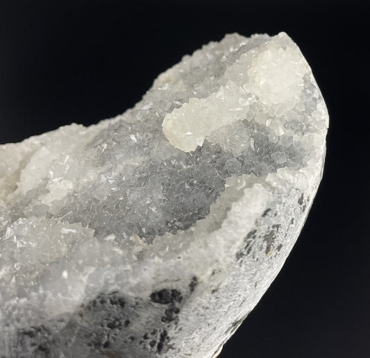 A zeolite cluster with distinctive earth-toned crystal formations.