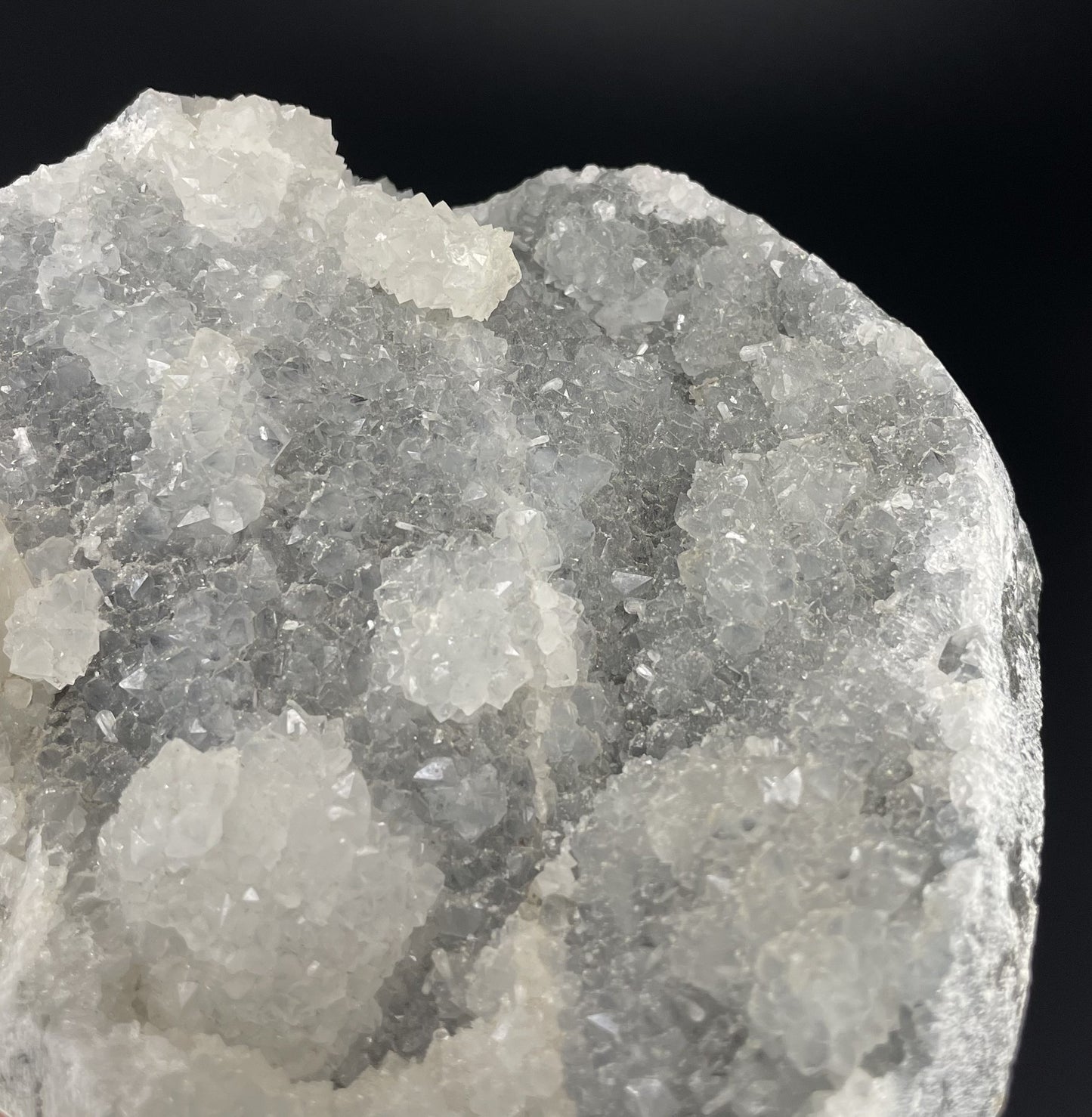 A zeolite cluster with distinctive earth-toned crystal formations.