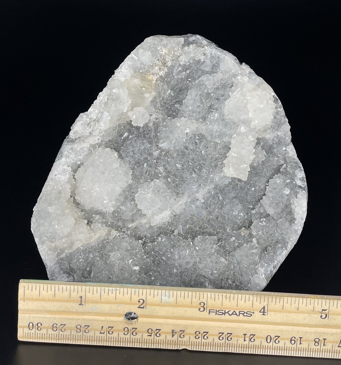 A zeolite cluster with distinctive earth-toned crystal formations.