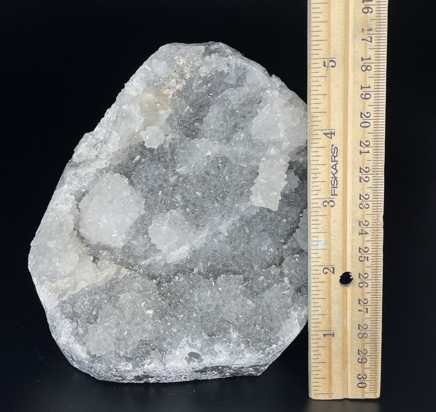 A zeolite cluster with distinctive earth-toned crystal formations.