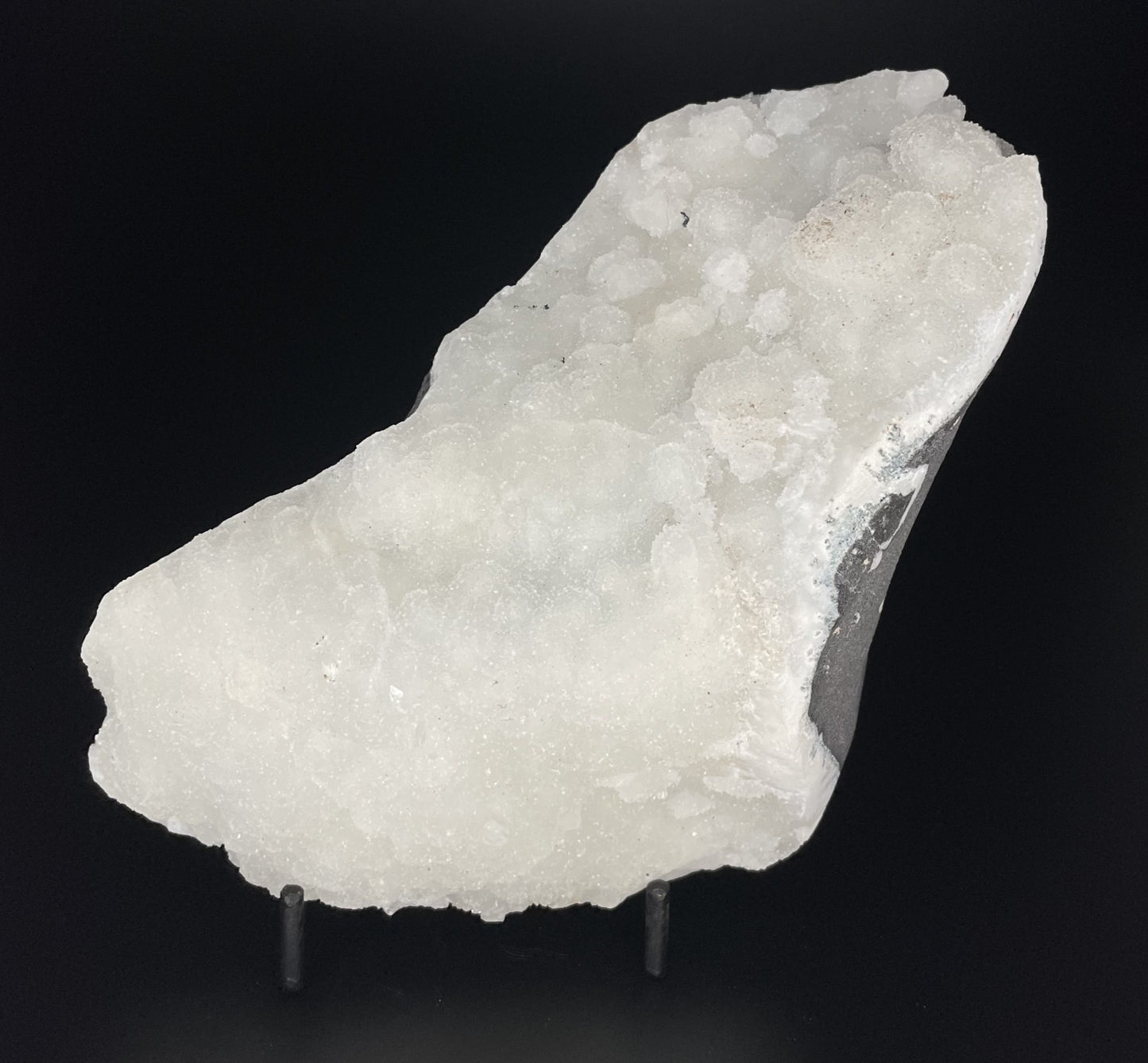 A zeolite cluster with distinctive earth-toned crystal formations.