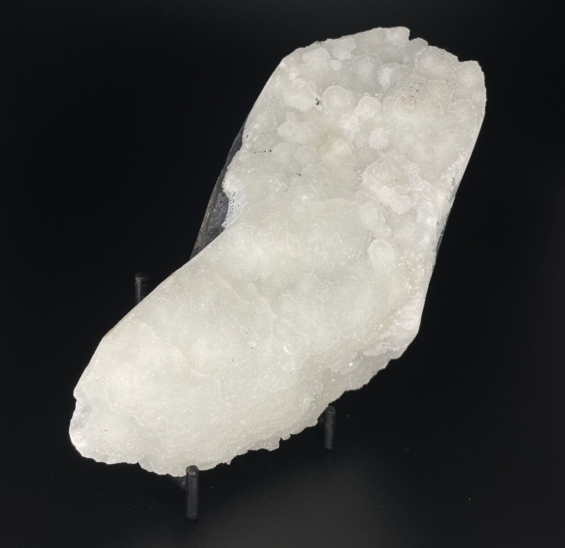 A zeolite cluster with distinctive earth-toned crystal formations.