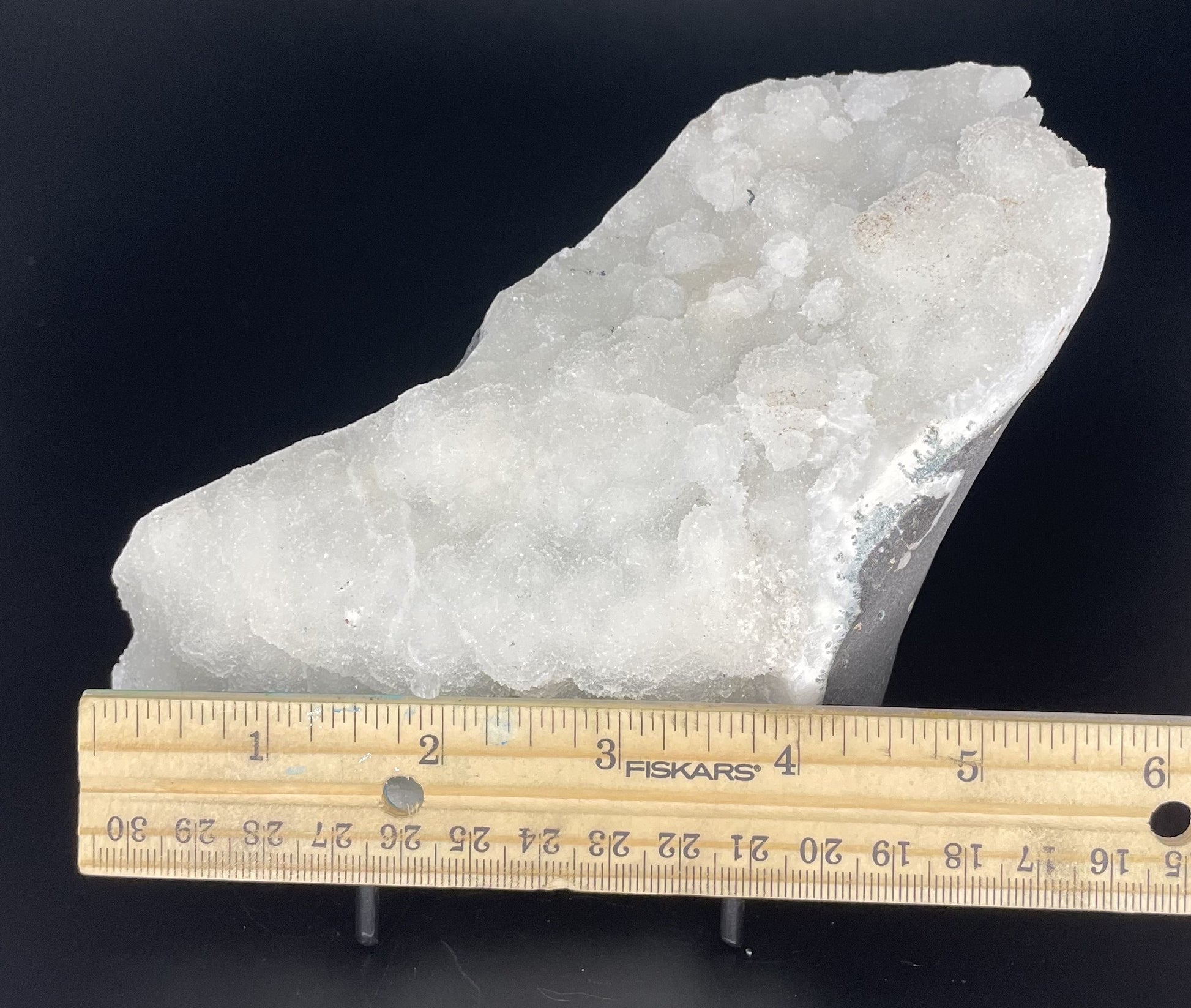 A zeolite cluster with distinctive earth-toned crystal formations.