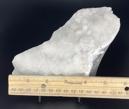 A zeolite cluster with distinctive earth-toned crystal formations.