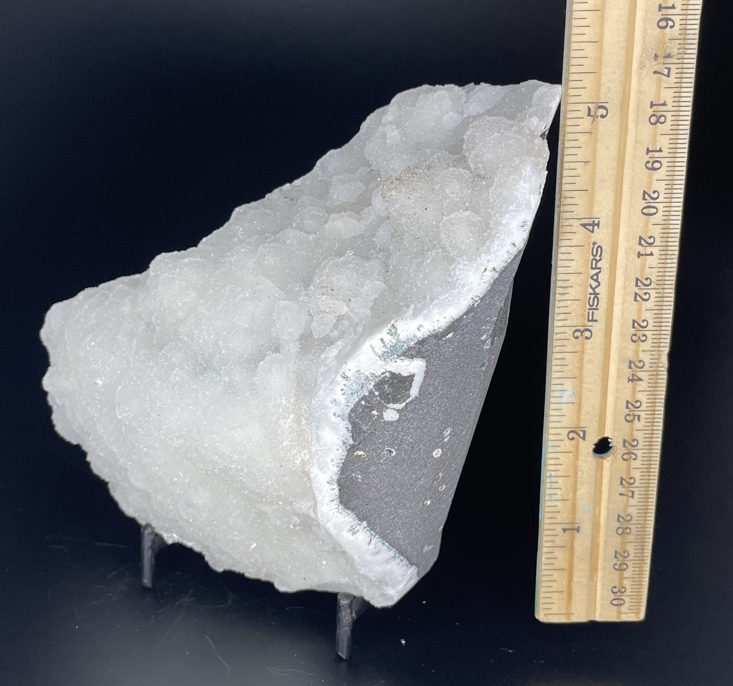 A zeolite cluster with distinctive earth-toned crystal formations.