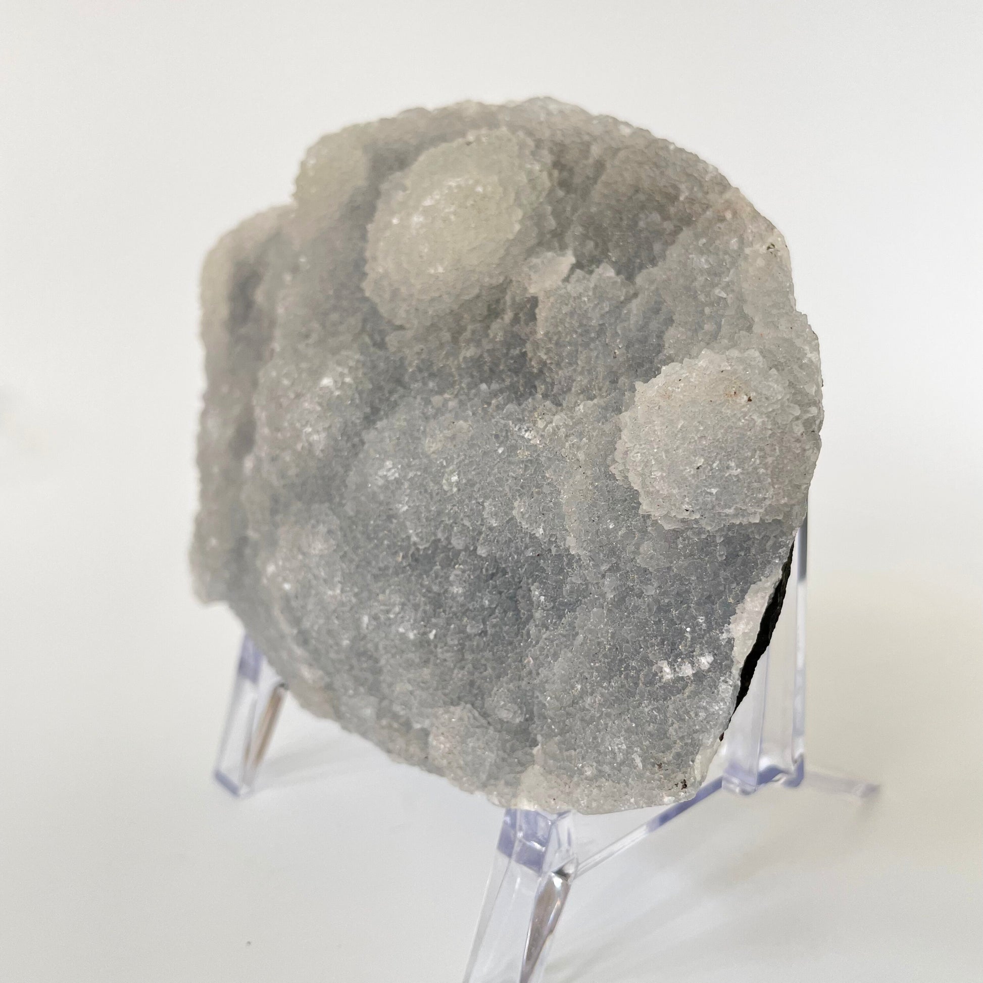 A 4.5-inch rare blue chalcedony cluster with soft blue hues on a white background.